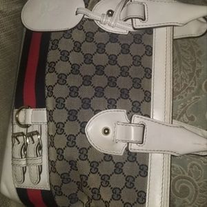 Slightly used large blue web Gucci handbag